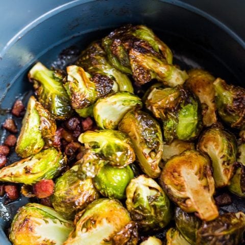 air fryer Brussels sprouts in the basket of the instant pot air fryer lid with pancetta