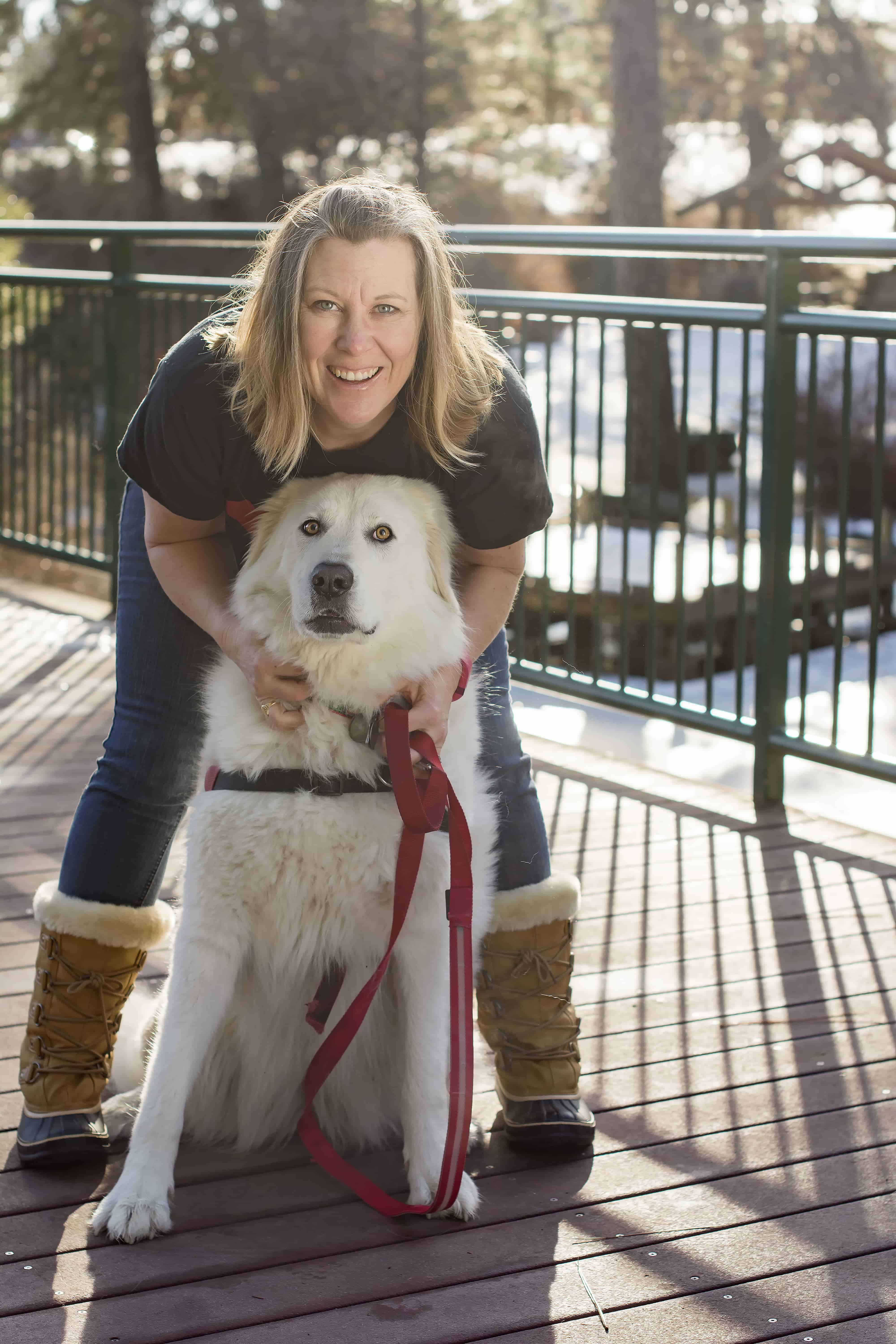 noses and toes pet photography photographer Angela from Noses and Toes Photography with her pup, Bella!