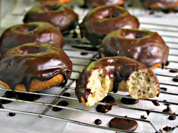 A chocolate covered donut on a wire rack, Mocha Glazed Baked Donuts