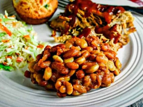 mixed baked beans on white plate