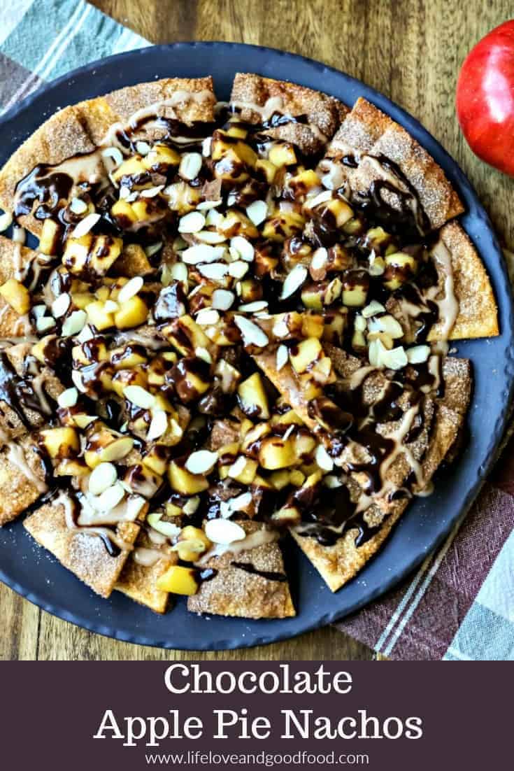CHOCOLATE Apple Pie Nachos make a fun party dessert. Cinnamon pie dough “tortilla chips” are loaded with a brown sugar apple compote, decadent chocolate ganache, a cinnamon glaze, and slivered almonds. #apple #chocolate #pie #nachos #dessert #recipe #partyfood #ganache