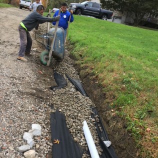 driveway and landscape drainage - asphalt maintenance
