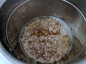 Grinding the Rice and Ragi