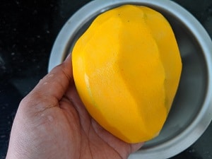 Peel the mango