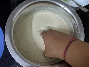 Mix batter with hands to aid fermentation