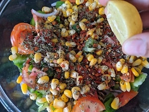 Adding the seasoning and herbs