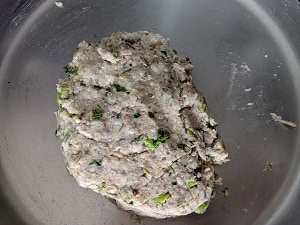 Mixing the ingredients into a tight dough