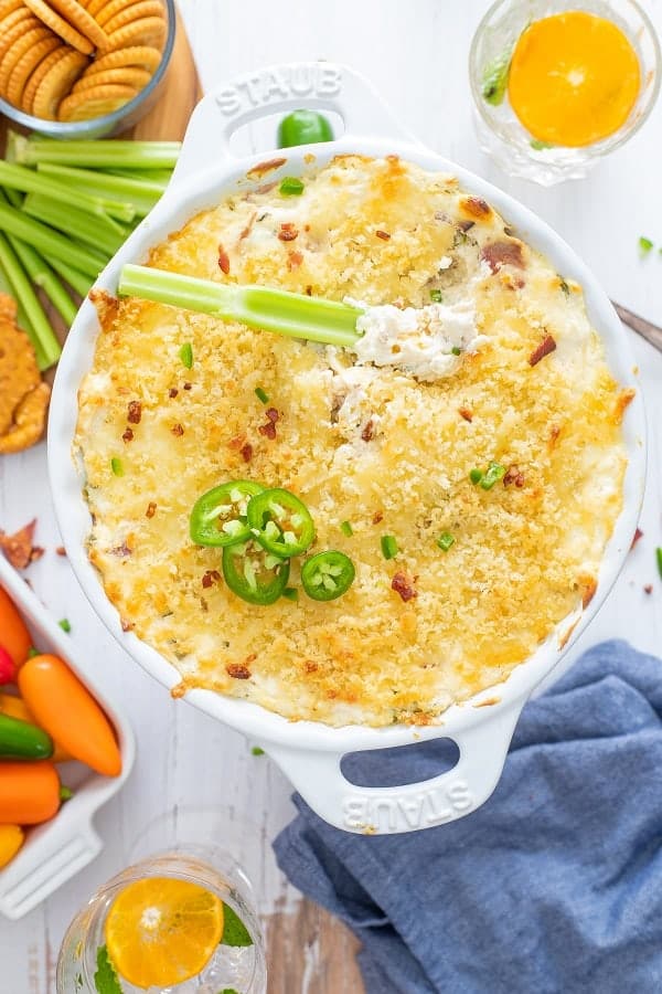 Your favorite Jalapeño Poppers turned into a delicious dip. Can be served with veggies, chips, or crackers. It's Keto Friendly and low carb. Perfect for your next get together. via @Mooreorlesscook