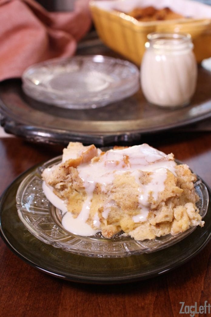 bread pudding on a plate with whiskey sauce | one dish kitchen