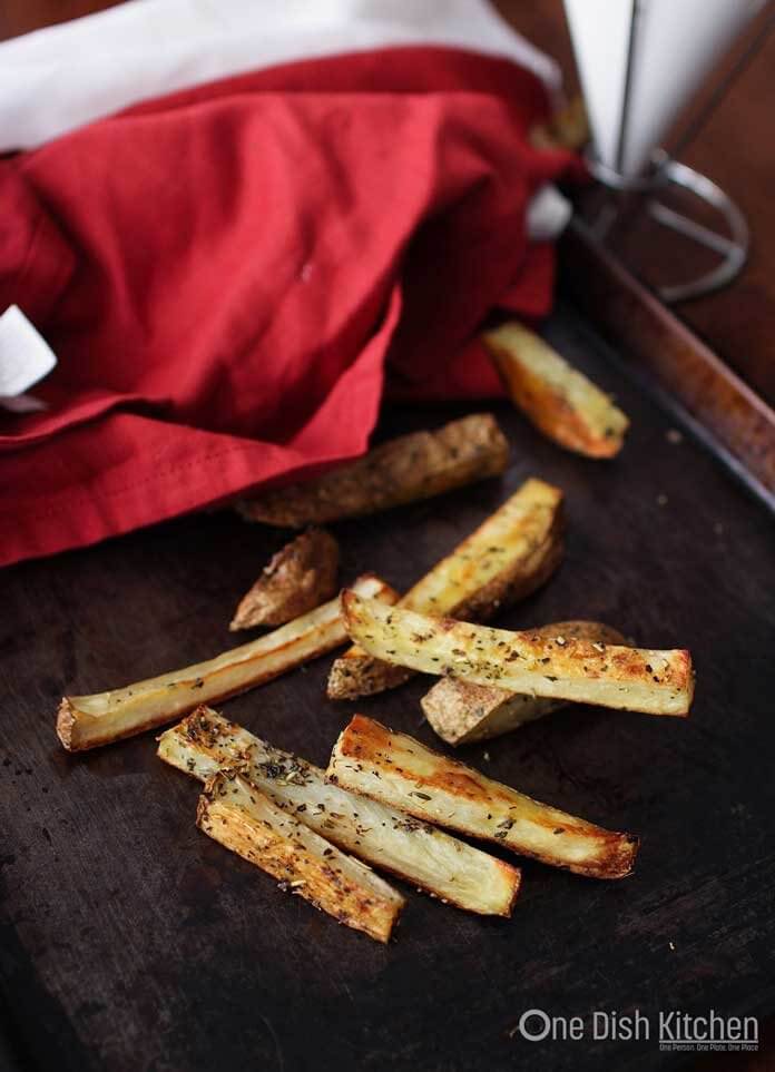 baked french fries on a baking sheet