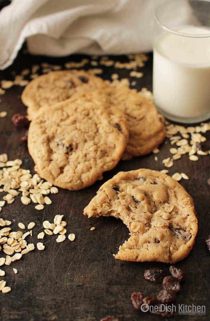 Oatmeal cookies on a tray with milk | One Dish Kitchen