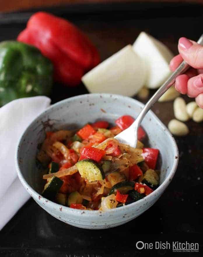 ratatouille in a bowl with a fork | one dish kitchen