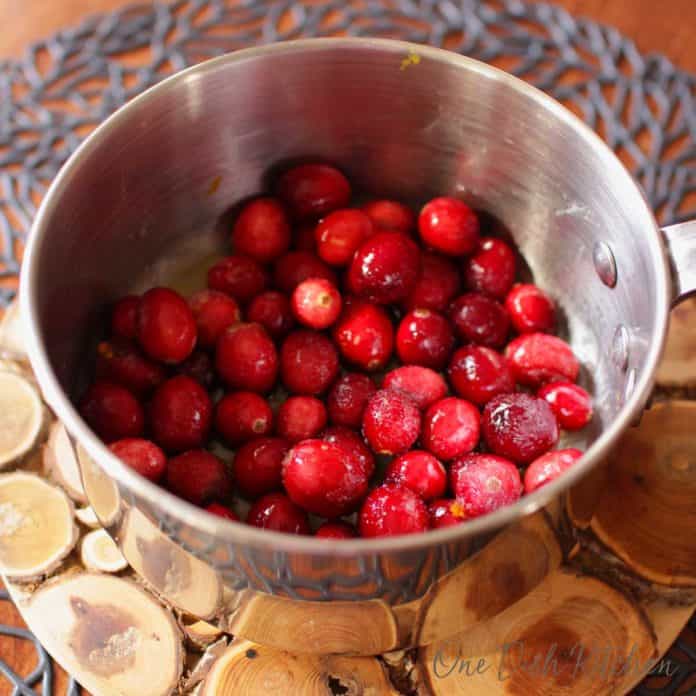 cranberries in a pot for making cranberry jam | one dish kitchen