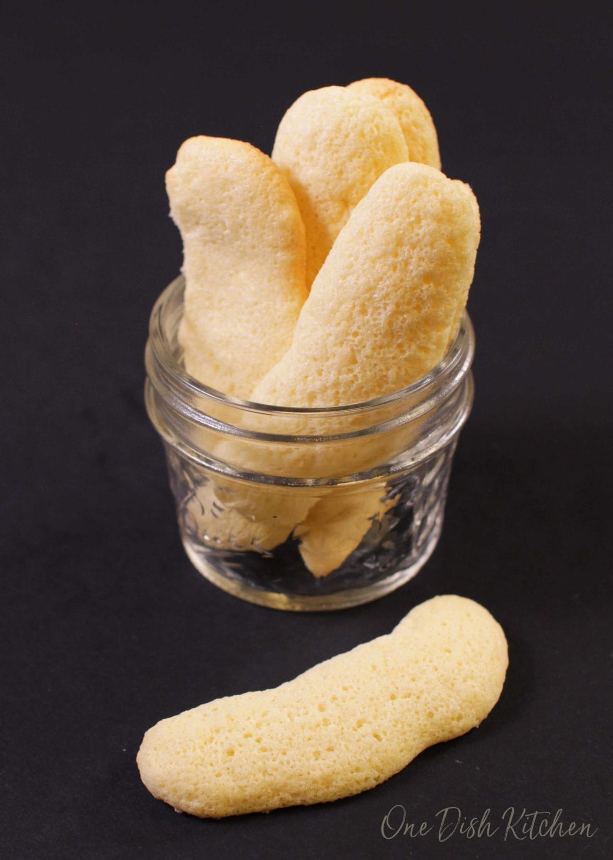 a jar filled with homemade ladyfingers | one dish kitchen