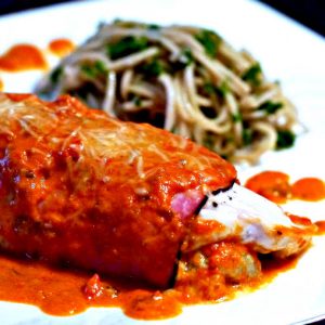 Chicken Stuffed With Artichoke In Tomato Basil Sauce