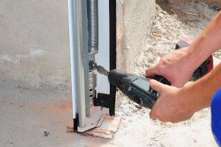 Garage Door Spring Repair Garage Door Spring Repair