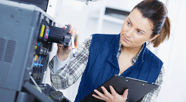 Woman Servicing Copier