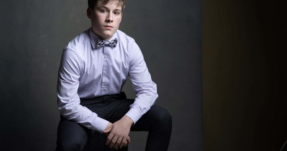 senior-pictures-stonetree-creative-maine-photographer-5 senior picture of young man in purple shirt