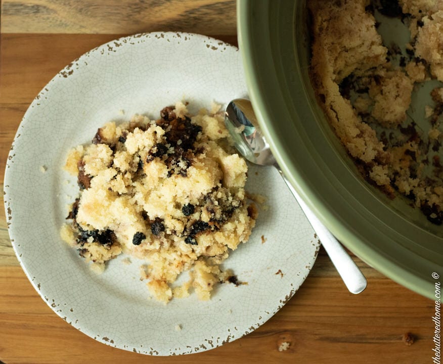a serving of crockpot blueberry cobbler