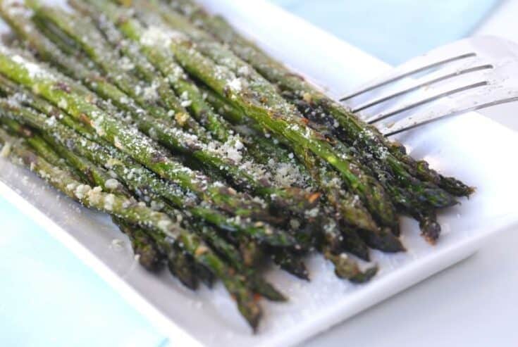 Roasted Asparagus with Garlic & Parmesan is a quick and delicious vegetable recipe. You can’t go wrong with fresh asparagus, garlic and parmesan!