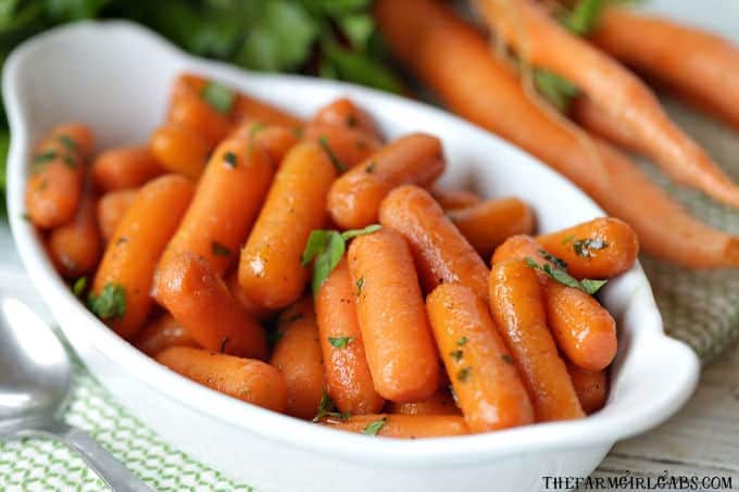 These Honey Glazed Carrots are a simple side dish to serve for any meal. They make a great holiday recipe for Thanksgiving and Easter too. #Carrots #SideDish #VegetableRecipe #Thanksgiving #HolidayRecipe