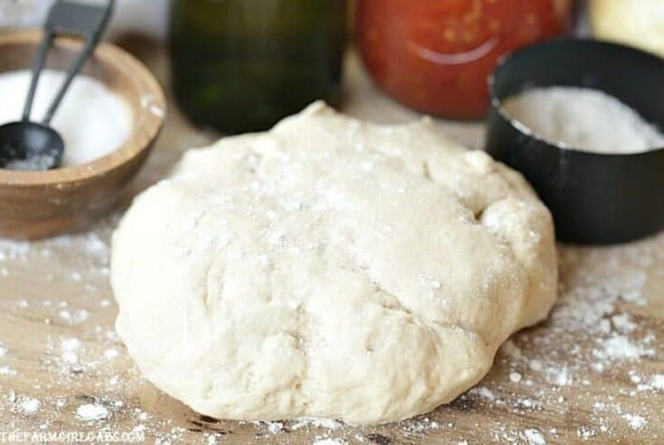 Make any night pizza night! With a few simple ingredients, this Best homemade Pizza Dough recipe is perfect for a tasty homemade pizza dinner at home. #pizzadough #pizzarecipe
