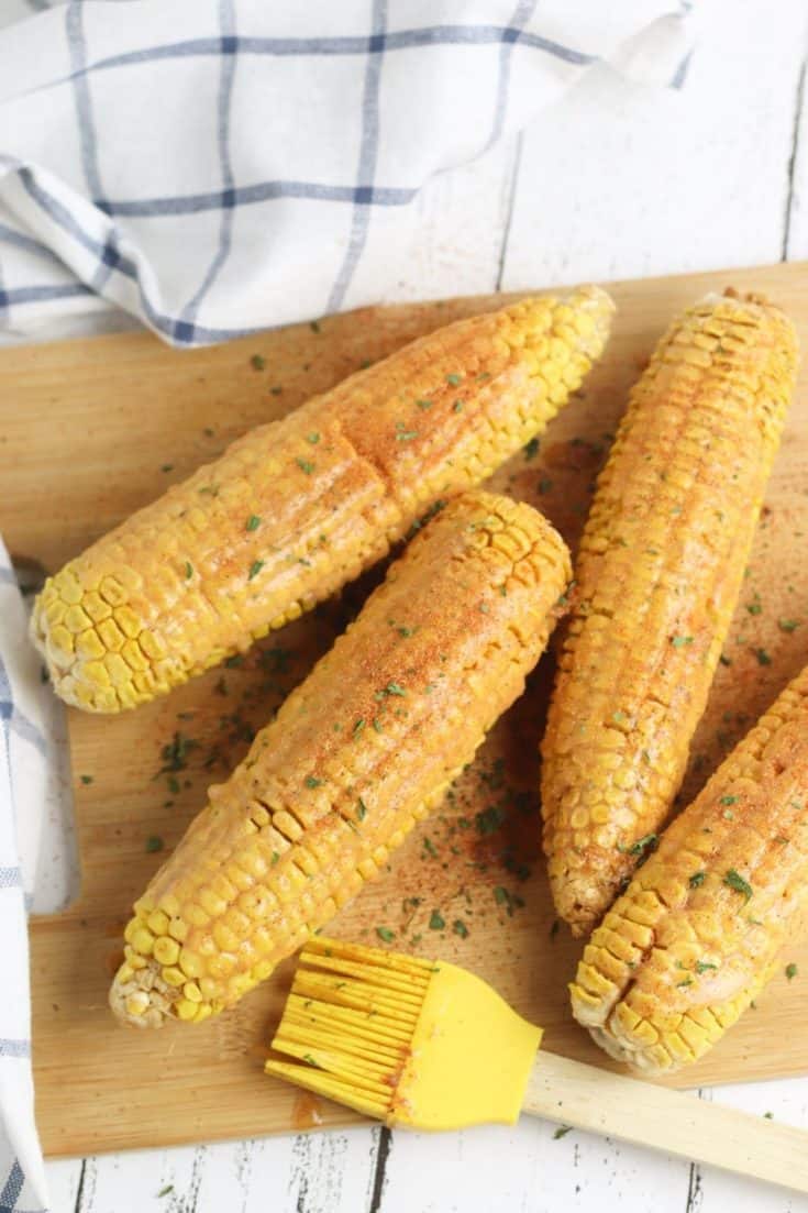 Summer calls for corn on the cob. Spice up your corn with this tasty Cajun roasted corn recipe. This easy corn ecipe is perfect for any summer BBQ. #Corn #CornRecipe #SummerRecipe #BBQ