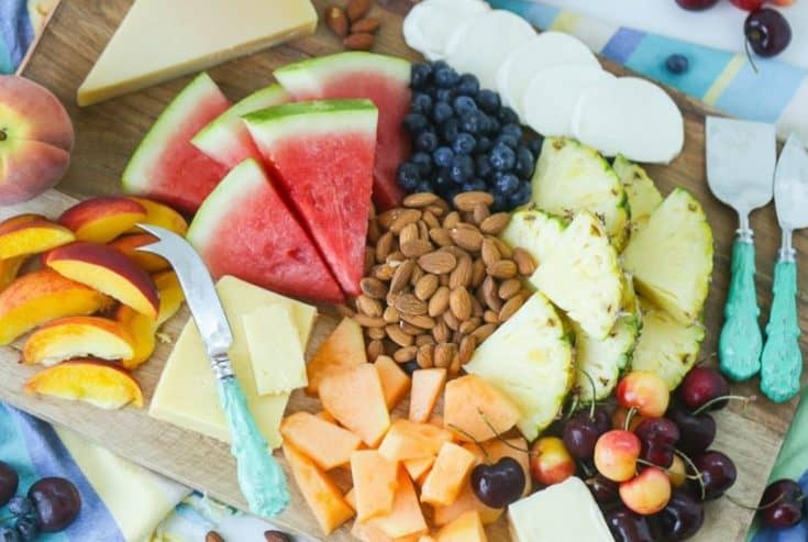 Take summer entertaining to the next level with this easy Summer Fruit And Cheese Board. This fruit and cheese board is an easy party recipe. Your guests will love this Charcuterie board made with fresh summer fruits, cheeses and Blue Diamond Almonds. #ad #WholeNaturalAlmonds, #SimplyDelicious #cheeseboard
