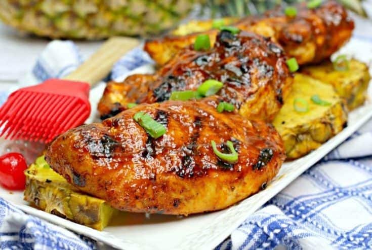 This flavorful Grilled Huli Huli Chicken recipe is delicious and simple. This Hawaiian-inspired chicken recipe is marinated and grilled to perfection.