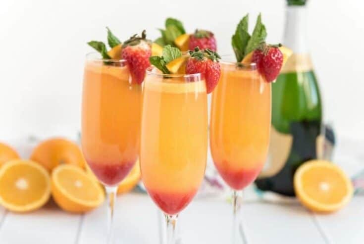 Mimosa Cocktails aren't just for brunch. These Farm Fresh Strawberry Mimosas are great to serve for any party or occasion. This easy cocktail is perfect when strawberries are at their peak.