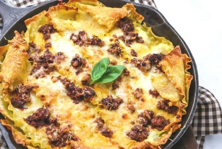 Cast Iron Skillet Lasagna is an easy twist on the classic Italian recipe. This Cast Iron Lasagna makes a great weeknight meal idea. Grab your skillet and get cooking!