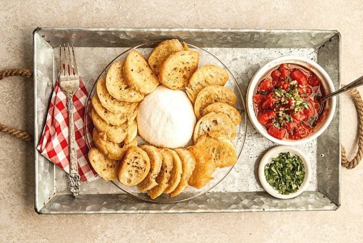 Need a quick appetizer recipe? Try this easy Burrata And Fire Roasted Tomato Bruschetta for your next party or gathering. Your guest will love this easy bruschetta recipe.