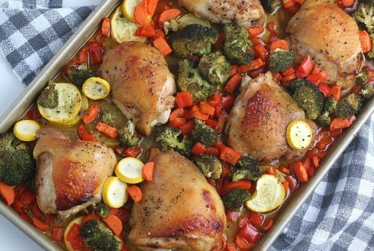 Want to make a delicious mess-free meal that is good for you? Try this health Sheet Pan Chicken and Vegetables Dinner consisting of chicken thighs, broccoli, carrots, and more! You will love this easy weeknight meal idea.