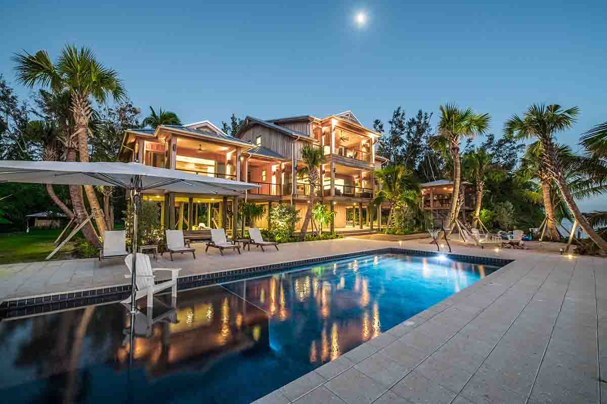 FloridaCharm4 Florida House with full moon rising over pool and home