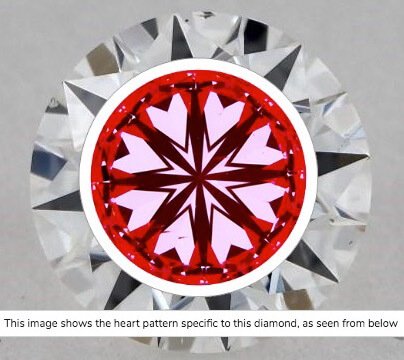 Hearts-Scope-Aufname von Diamant 0,71ct Farbe F Reinheit VS2. Gleichmäßig verlaufende symmetrische Figuren der Herzen. Im unteren Bereich 2 Einschlüsse Hearts-Scope-Aufname von Diamant 0,71ct Farbe F Reinheit VS2. Im unteren Bereich 2 Einschlüsse, die jedoch mit normalen Augen (bei VS2) nicht sichtbar sind