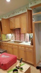 Before: kitchen cabinet refinishing