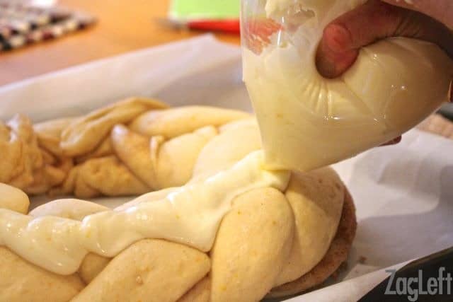 King Cake Recipe - ZagLeft - piping the cream cheese filling