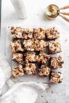 Thick fudgy brownies topped wtih marshmallows, chocolate, and peanuts. All the flavors of old fashioned rocky road ice cream in our favorite form: brownie.