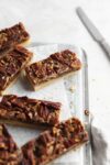 Holiday cookie exchange in your future? We got you covered with these easy maple pecan cookie bars complete with a buttery shortbread base and maple topping