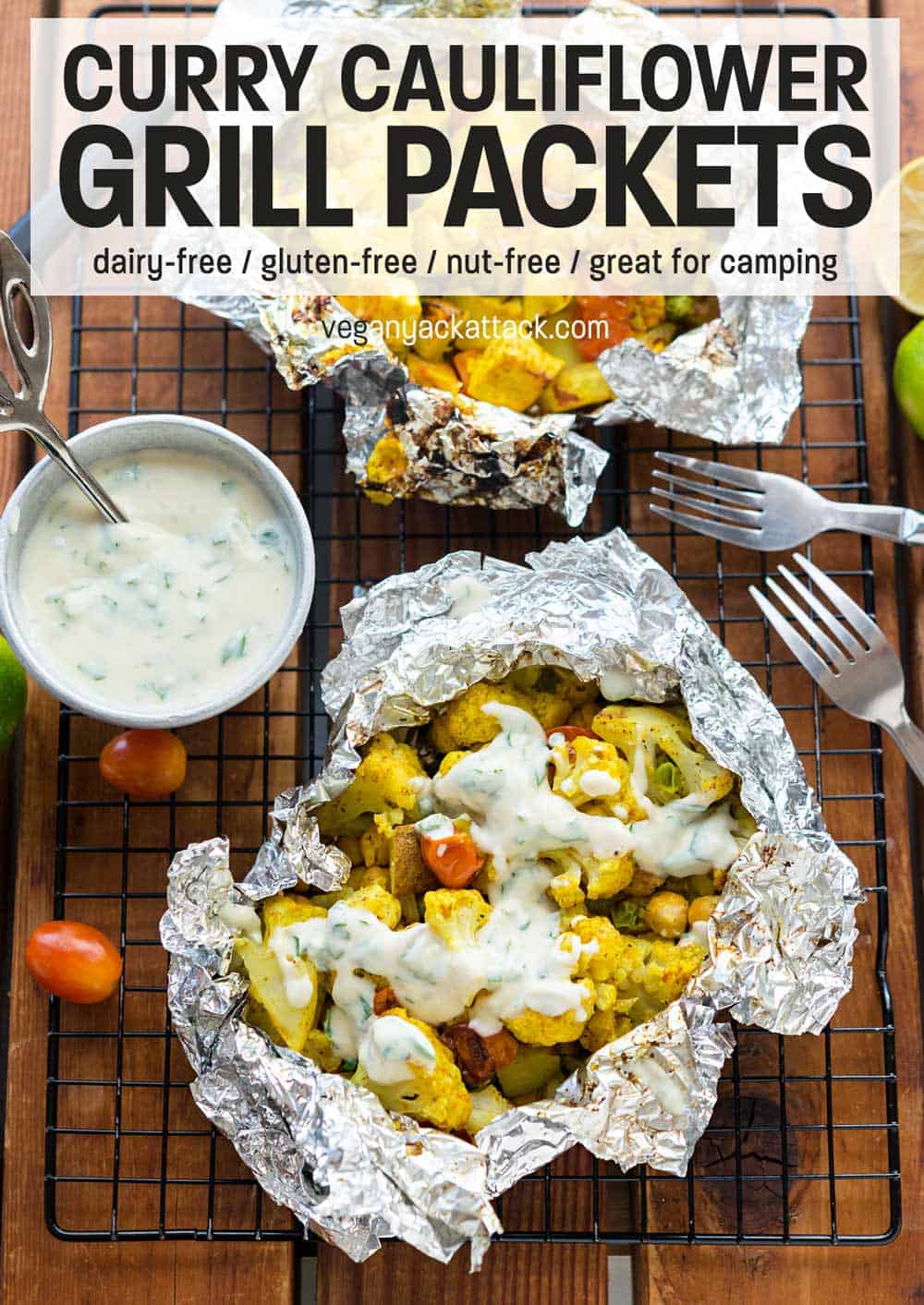 Grill packet filled with curry cauliflower veggie mixture topped with yogurt sauce