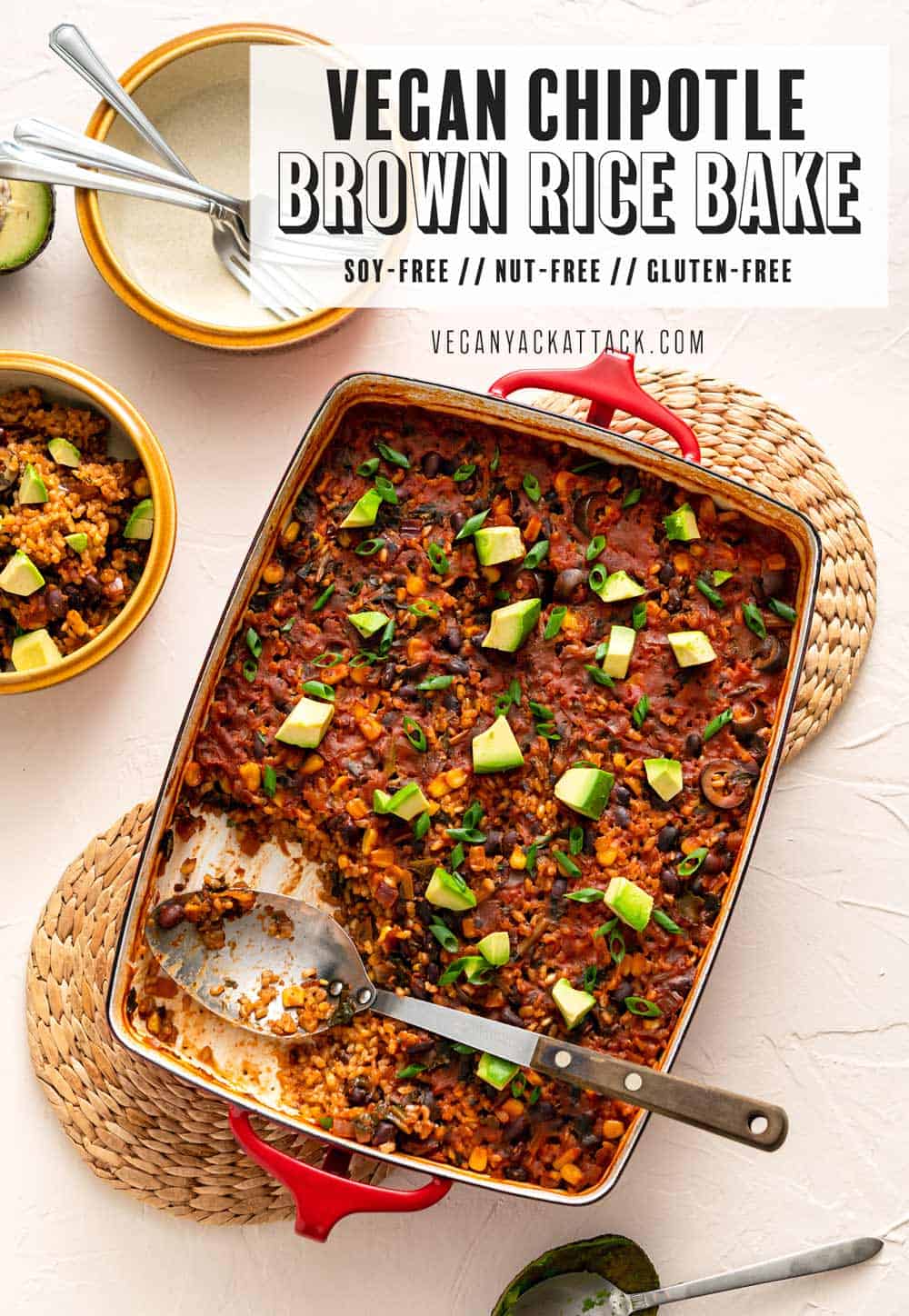 Image of chipotle brown rice bake in a red casserole dish on a beige background