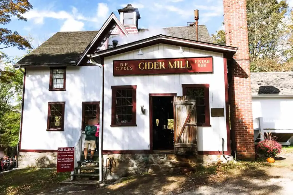 BF Clyde's Cider Mill - Visit BF Clyde's Cider Mill in Old Mystic, CT for the best apple cider and cider donuts anywhere! This 137-year-old steam powered cider mill (the oldest in the US) is a must if you're in Southestern CT in the fall. #clydescidermill #newengland #connecticut #mysticct #newenglandtravel #connecticuttravel #thingstodoinct #fallinct #fallinnewengland