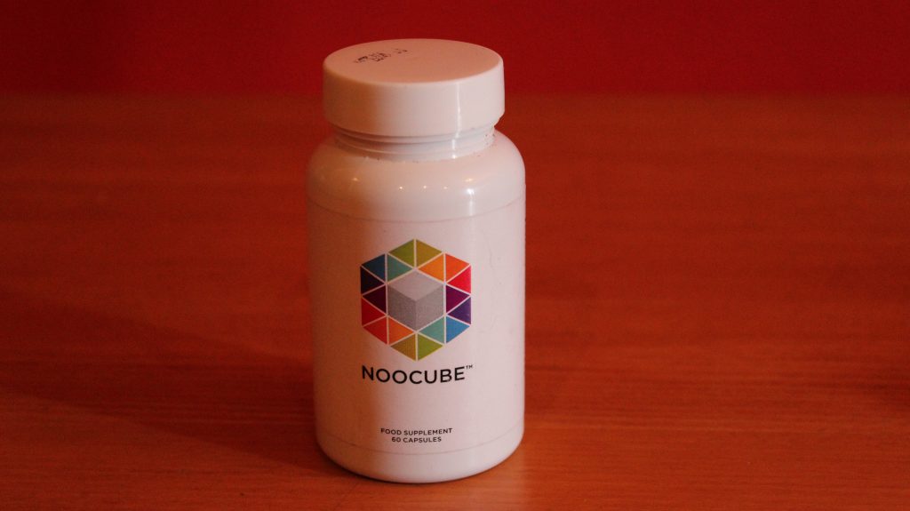NooCube bottle on the table - front view