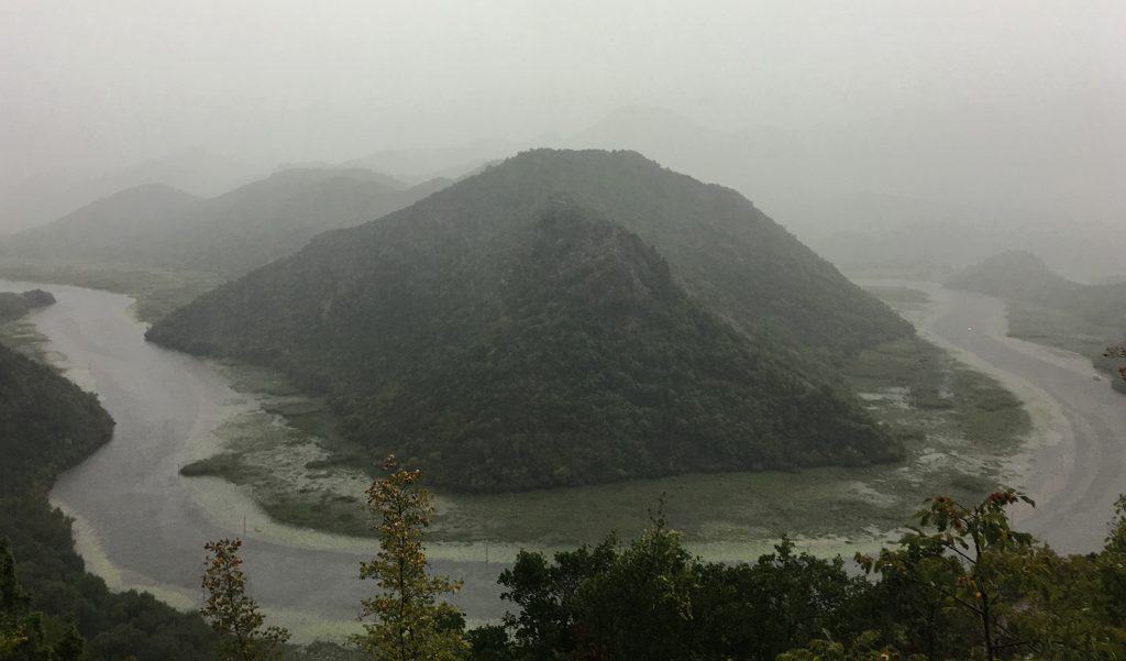 Lake Skadar: unfortunately this is the best picture I could take in the pouring rain. This iconic picture of one of Lake Skadar bend is spectacular and usually lashing green , a part when is raining.