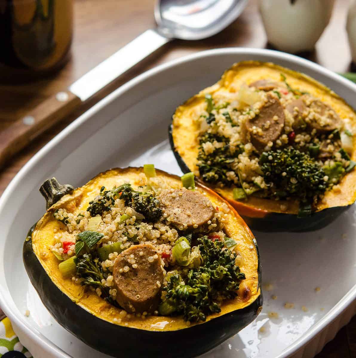 This simple and savory Quinoa-Stuffed Acorn Squash is easy-to-make and filled with nutritious ingredients!