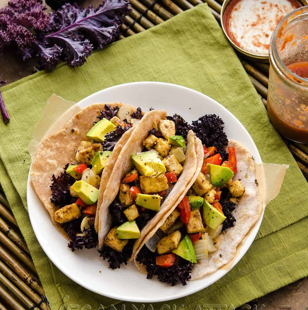 Simple and healthy roasted tofu kale tacos, with homemade tortillas! High in protein AND flavor, plus easy-to-make.