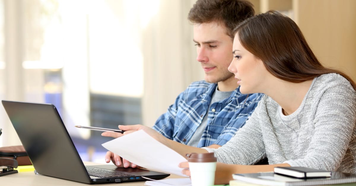 couple looking at quotes online