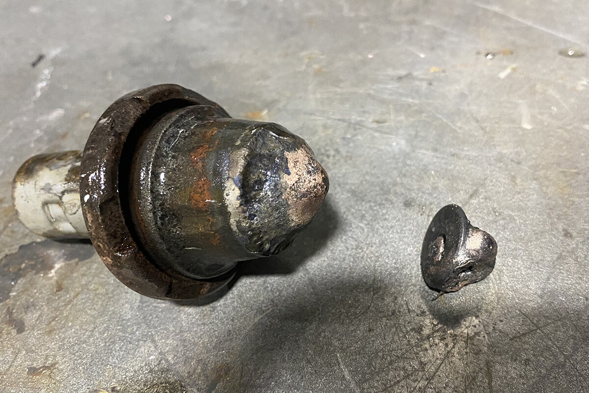 de-brazed carbide tooth from steel body of pavement cutting tool de-brazed carbide tooth from steel body of pavement cutting tool