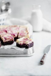 Black Cherry Cheesecake Brownies so rich and delicious you won't be able to stop at just one! Made with a black cherry swirl and fudgy brownie bottom.