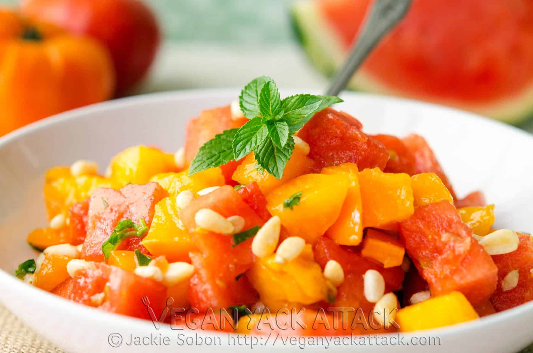 A refreshing Watermelon Tomato Salad, complimented with fresh herbs and pine nuts. Flavorful, light, and perfect for your summer gatherings!